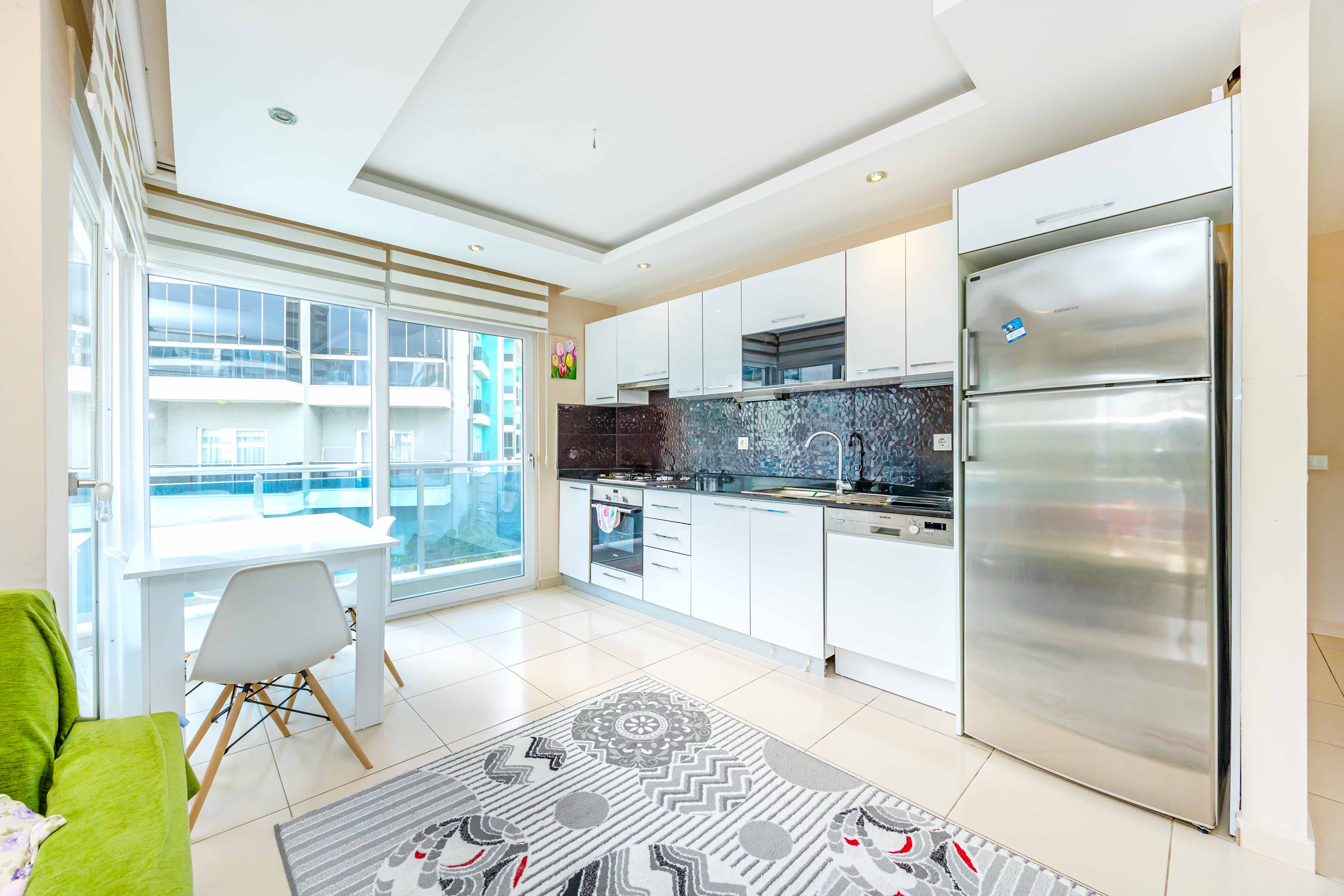 Oba bölgesinde 1+1 daire – eşyalı ve geniş teraslı