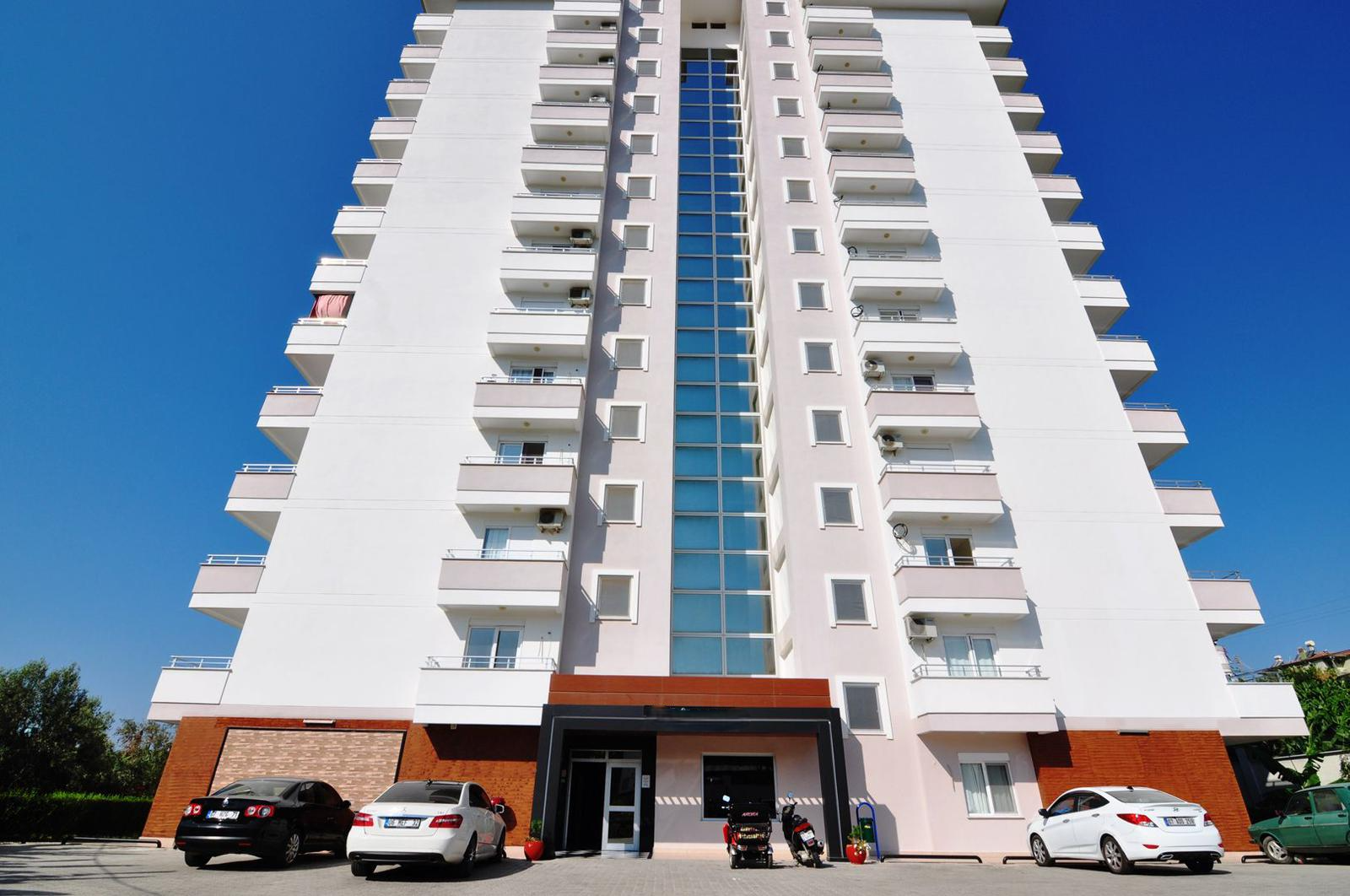 1+1 apartment in Mahmutlar – new furniture, 70 m², glazed balcony, sea and mountain views