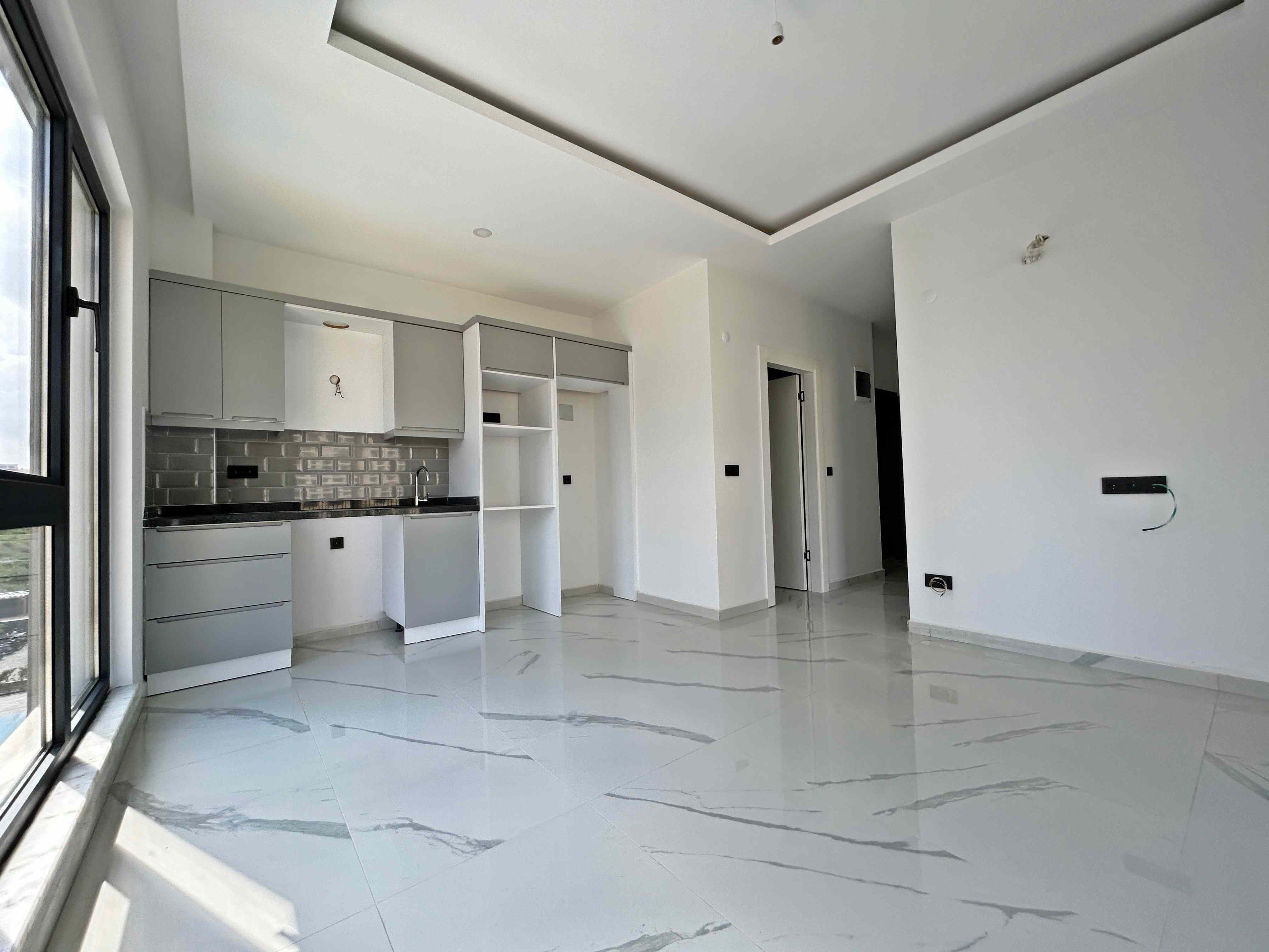 Apartments for citizenship in Mahmutlar – two-room apartments with fine finishing