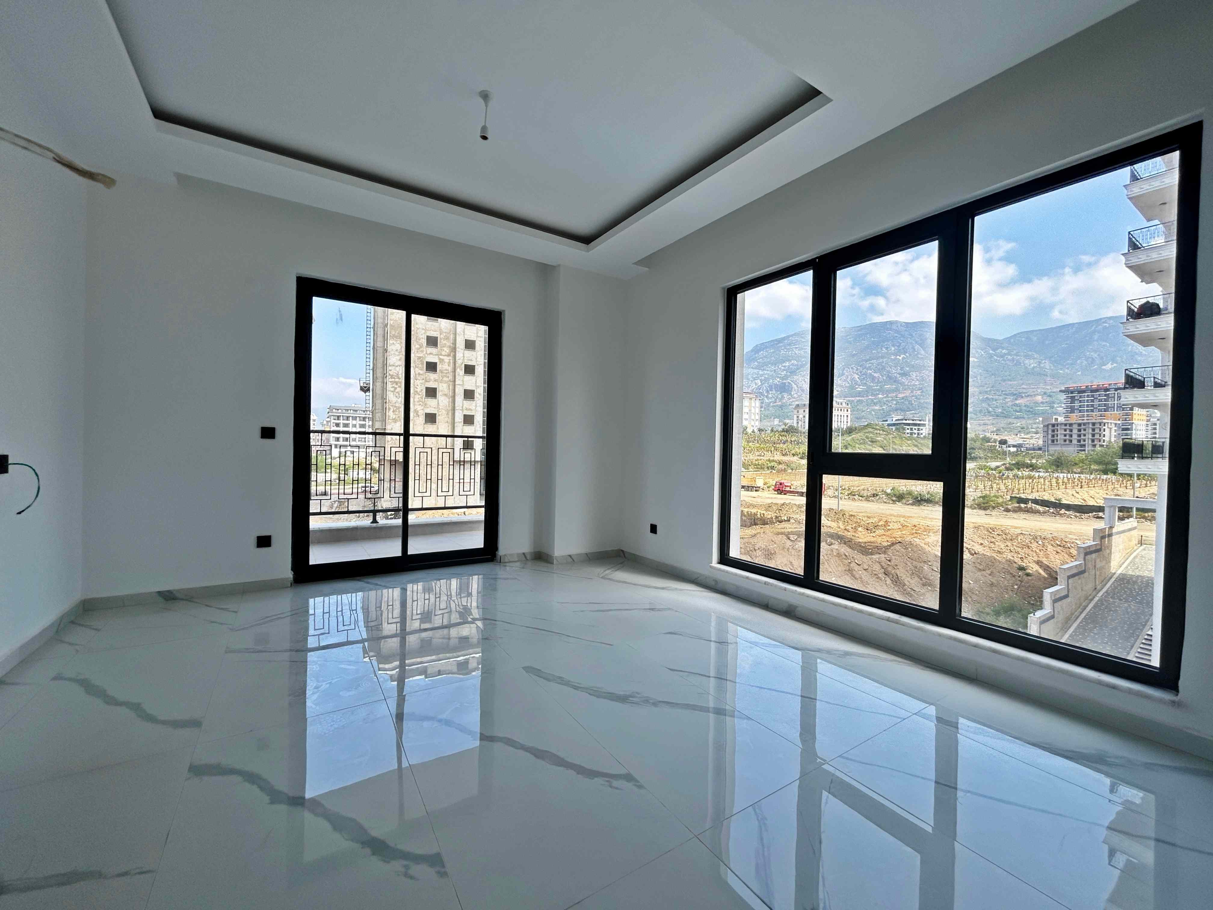 Apartments for citizenship in Mahmutlar – two-room apartments with fine finishing