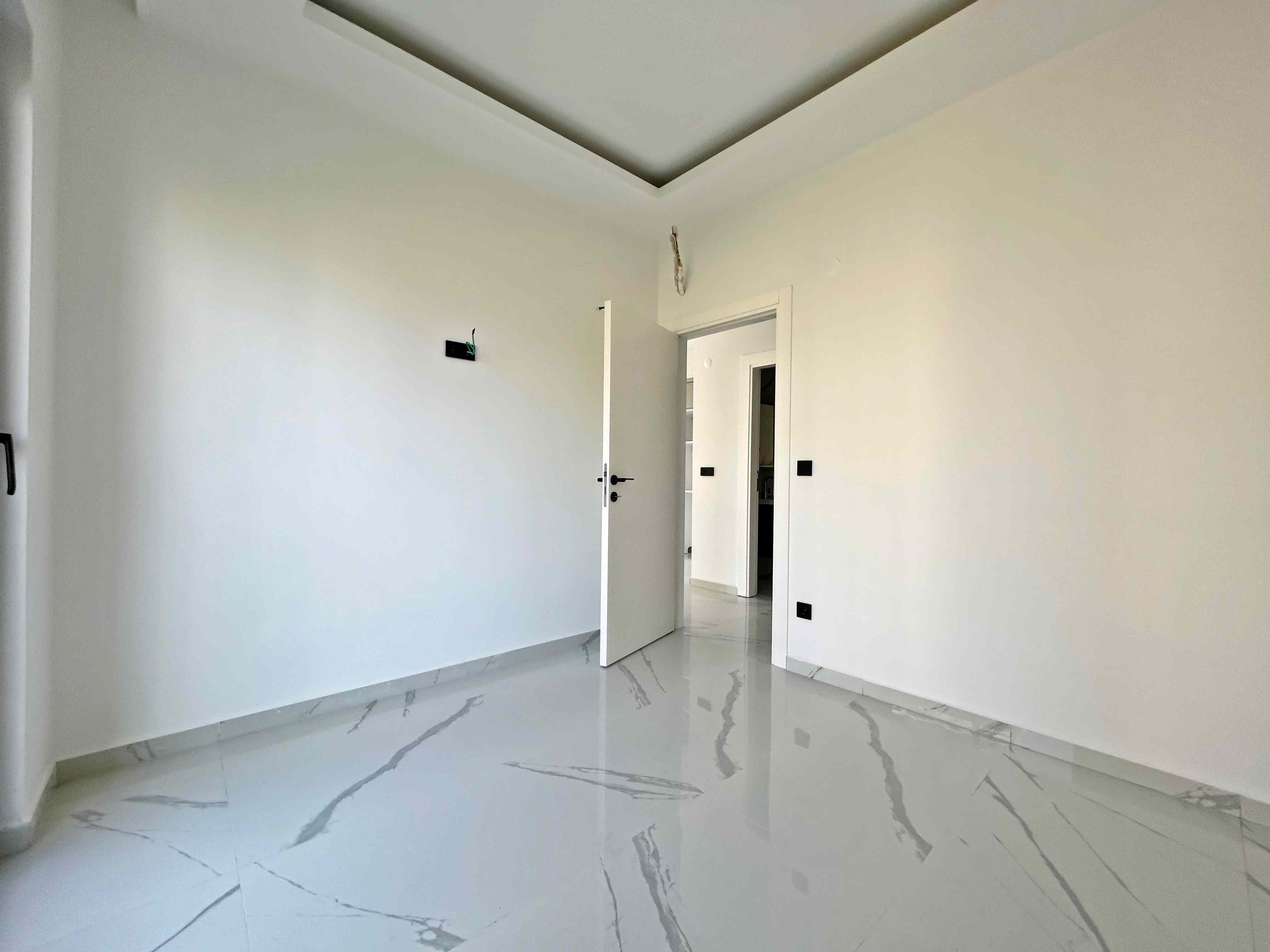 Apartments for citizenship in Mahmutlar – two-room apartments with fine finishing