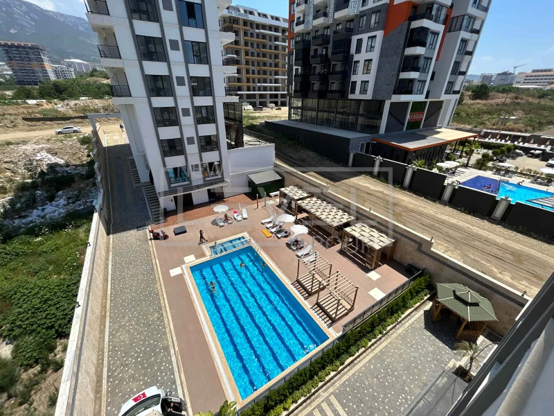 Apartments for citizenship in Mahmutlar – two-room apartments with fine finishing