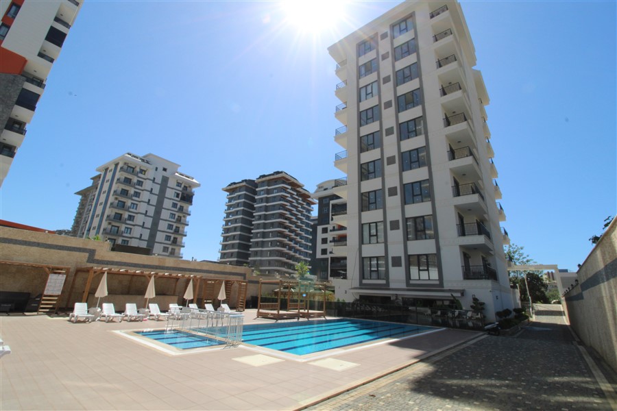 Apartments for citizenship in Mahmutlar – two-room apartments with fine finishing
