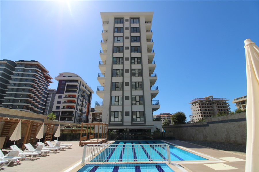 Apartments for citizenship in Mahmutlar – two-room apartments with fine finishing