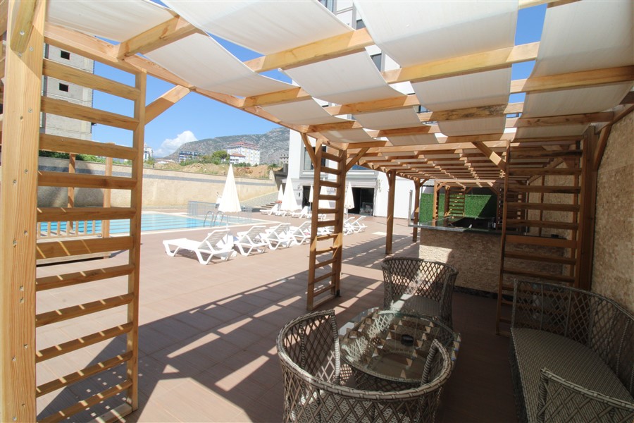 Apartments for citizenship in Mahmutlar – two-room apartments with fine finishing