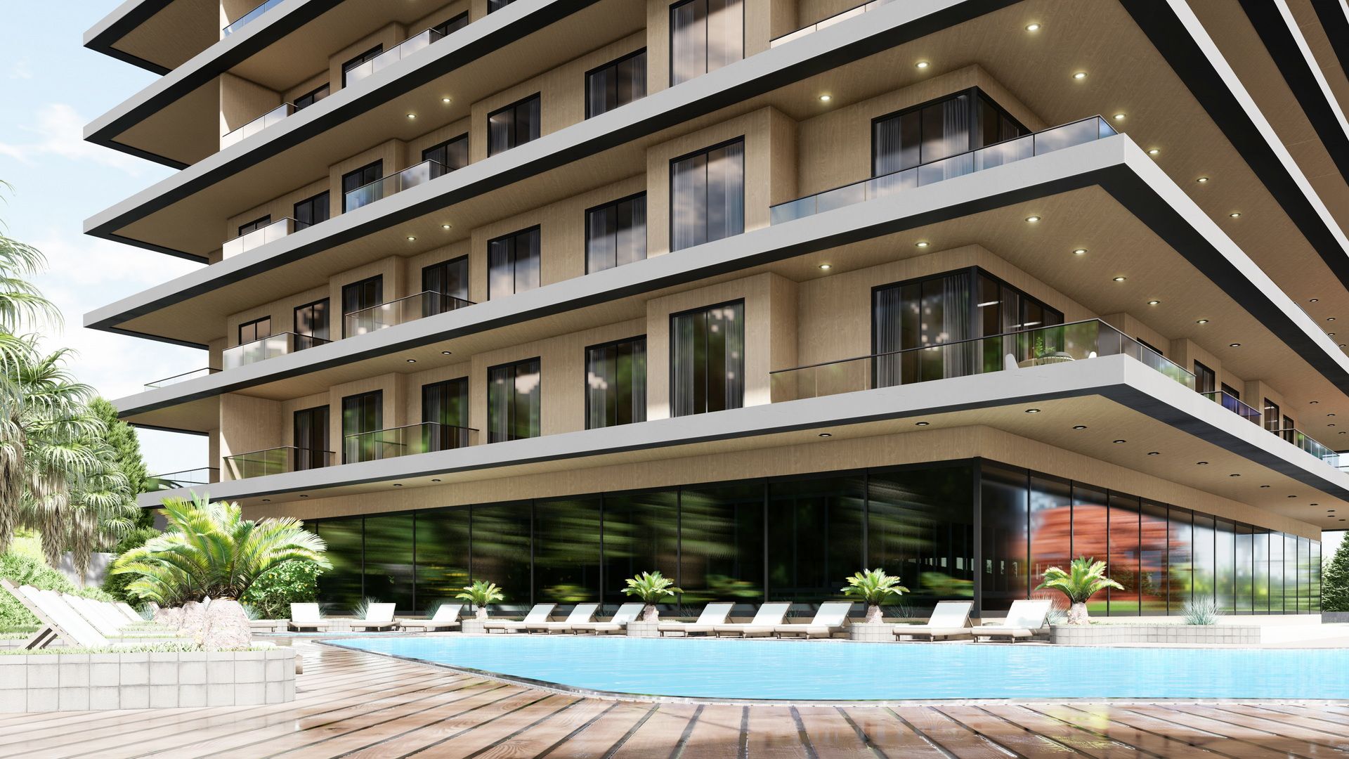 Ahşap deckli açık havuz, Tosmur’da penthouse dairelerin bulunduğu sitede şezlonglarla çevrili